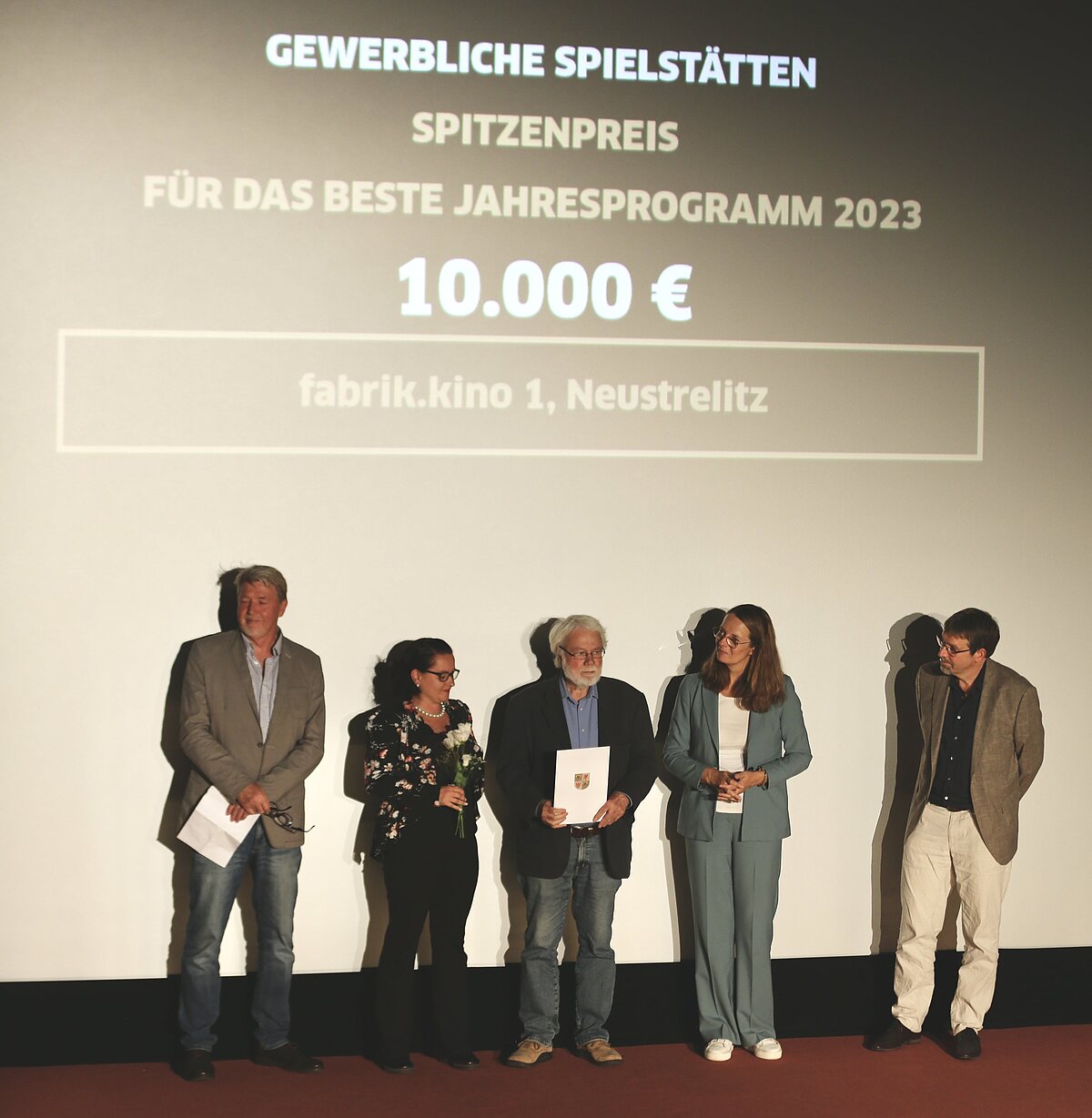 Spitzenpreisträger Preispate Dieter Schumann, Susanne Pahlke, Horst Conradt (beide Fabrik.Kino 1), Ministerin Bettina Martin u. Filmland MV GF Volker Kufahl